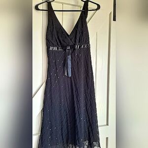 Elegant Black Dress with Silver Accents